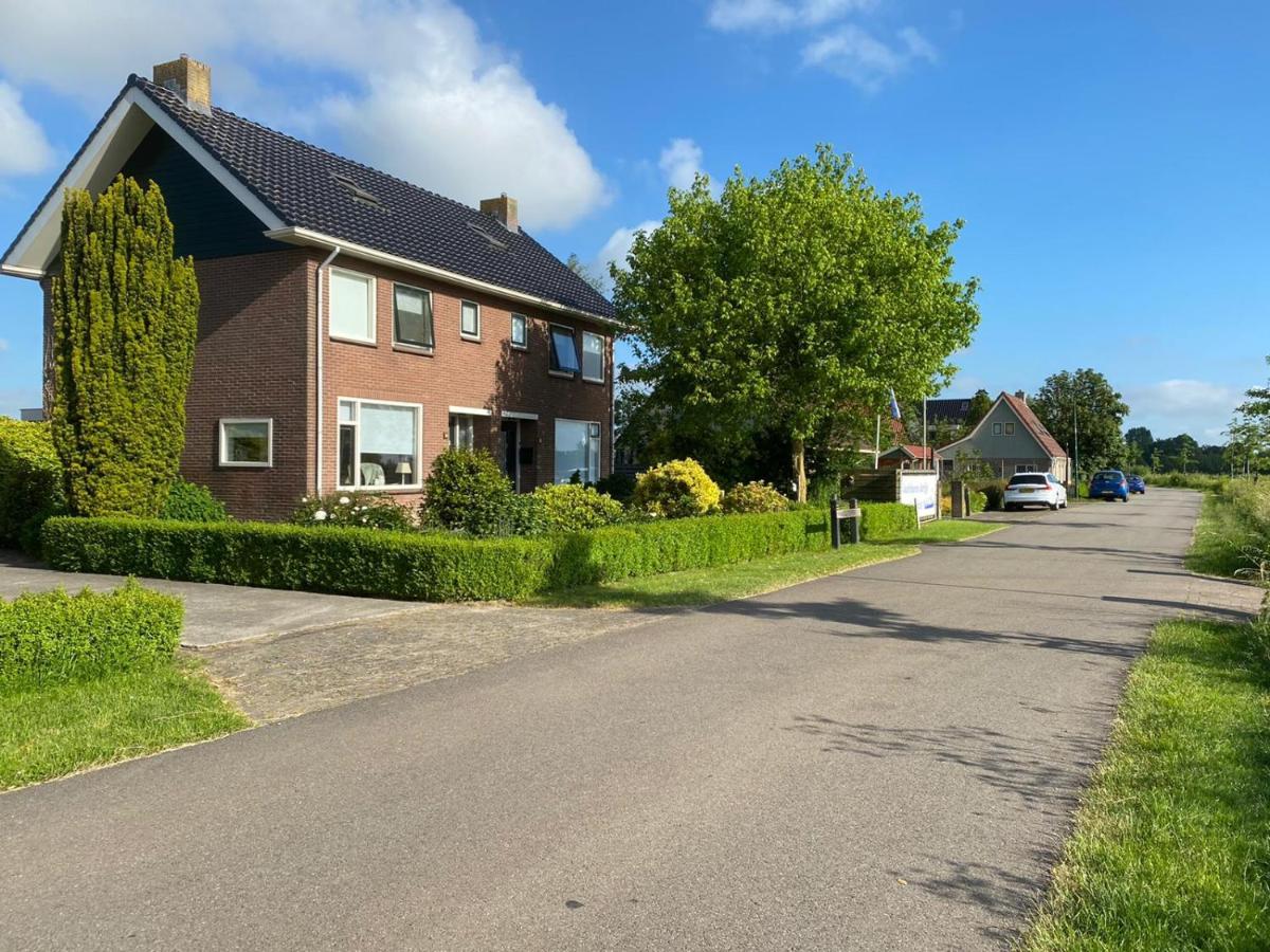 Huis Bij Het Water Met Sloepje Jutrijp 外观 照片