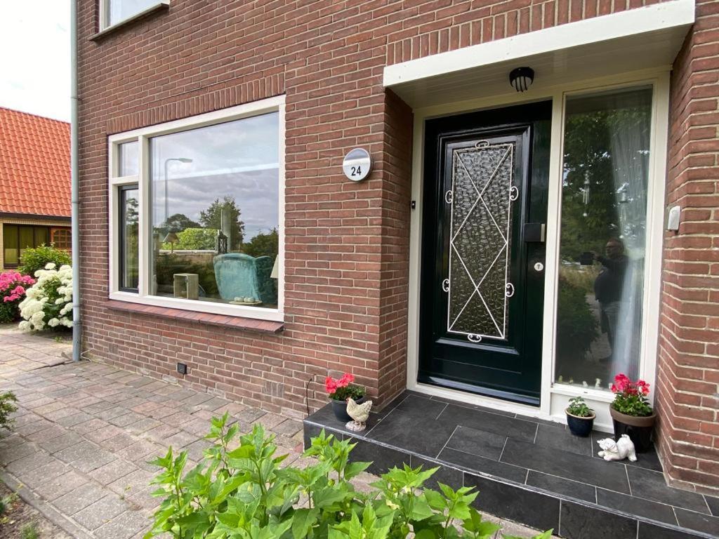 Huis Bij Het Water Met Sloepje Jutrijp 外观 照片