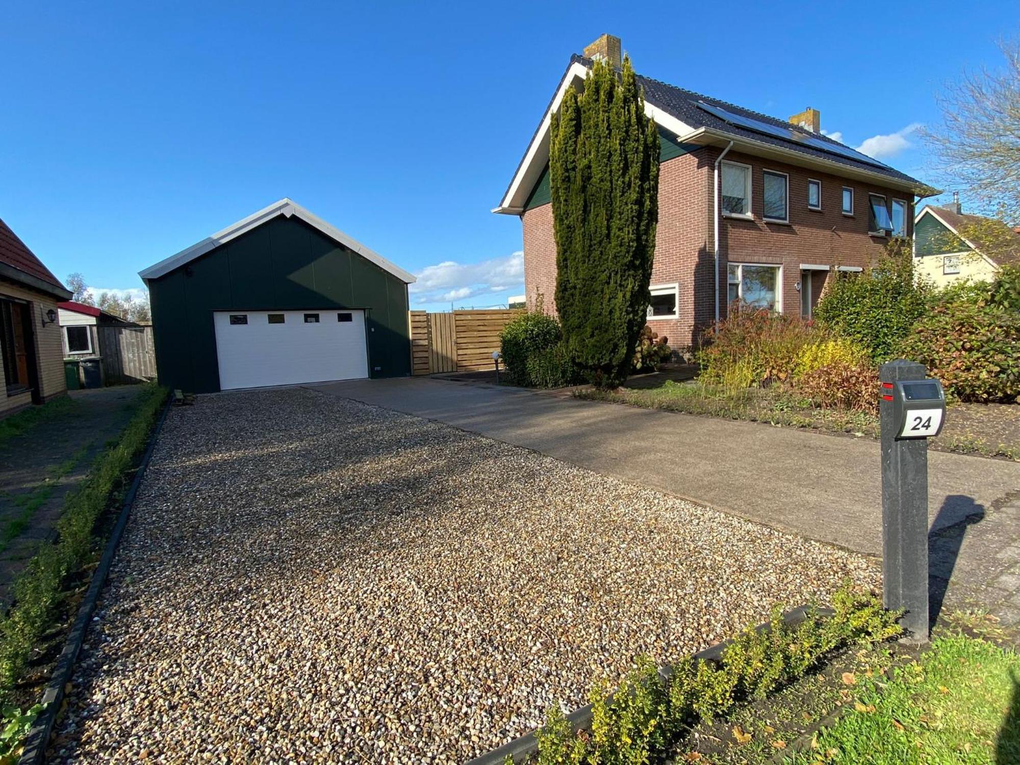 Huis Bij Het Water Met Sloepje Jutrijp 外观 照片